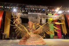 Queen of the Bands, Kadaffi Romney portrays Manzandaba in Flight, designed by Brian Mac Farlane for the band Africa.